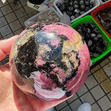 Load image into Gallery viewer, Natural Rhodonite Crystal Sphere – Polished Gemstone Ball for Collection &amp; Home Decor
