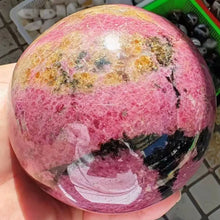 Load image into Gallery viewer, Natural Rhodonite Crystal Sphere – Polished Gemstone Ball for Collection &amp; Home Decor